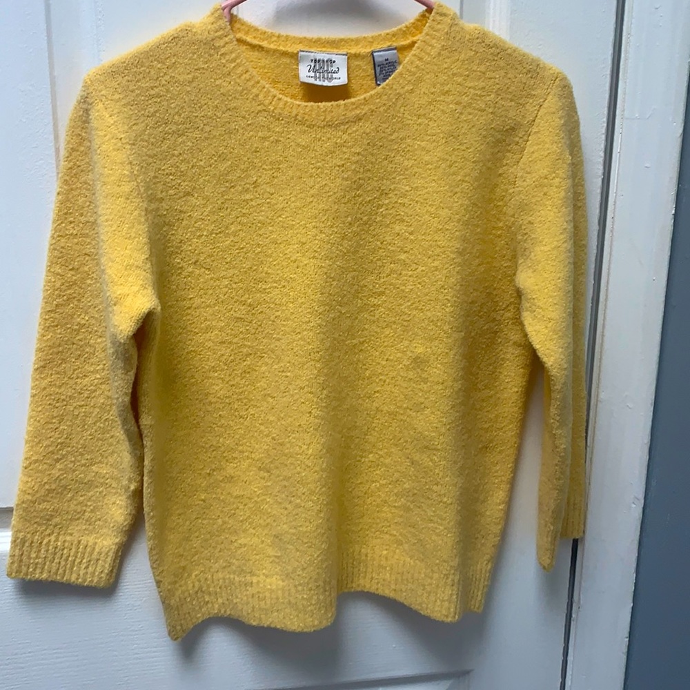 light yellow fuzzy sweater, size medium.